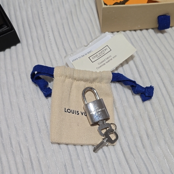 Louis Vuitton Silver Lock and Keys Set with LV Pouch - Picture 2 of 6